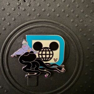 2025 Hidden Disney Pin Ursula D Logo
Hidden Mickey Pin